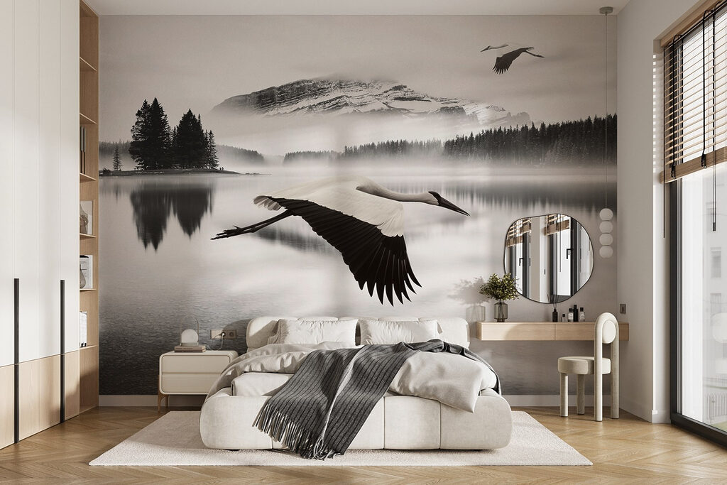 Bird flying over water