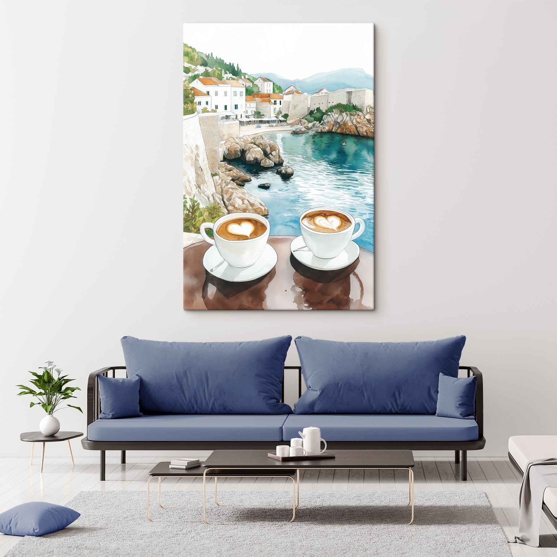 Two cups of coffee with a heart shaped foam on top of a table overlooking a body of water