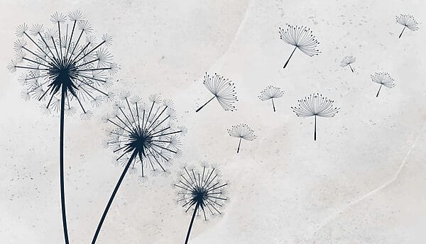 Group of dandelions flying in the air