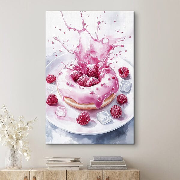 Un donut con glaseado rosa y frambuesas sobre un plato blanco Cuadros Un donut con glaseado rosa y frambuesas sobre un plato blanco