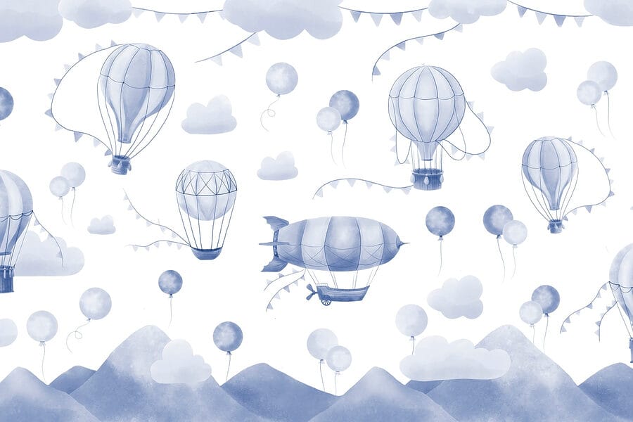 Grupo de globos aerostáticos y montañas