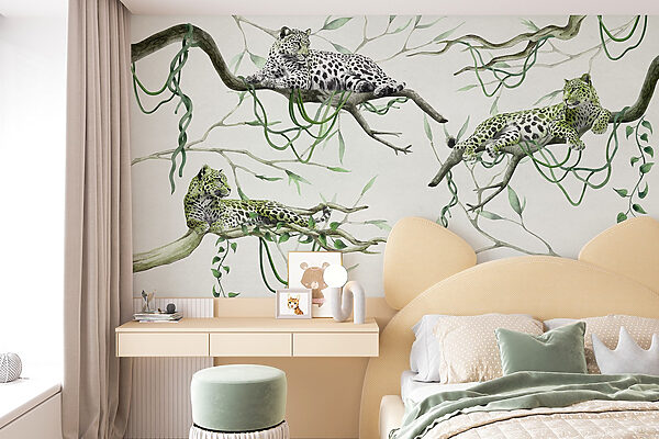 Group of leopards lying on branches