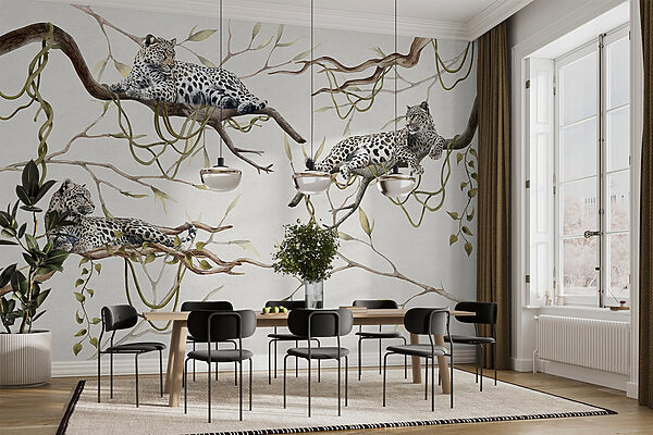 Group of leopards lying on branches