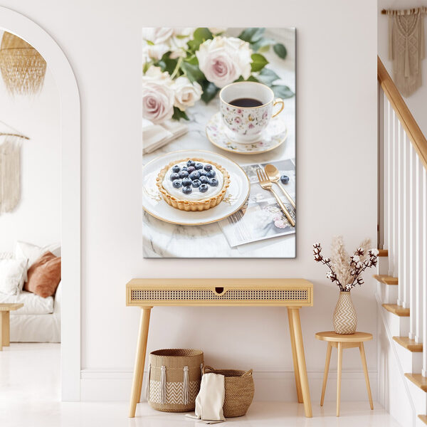 Dessert on a plate with a cup of coffee and flowers