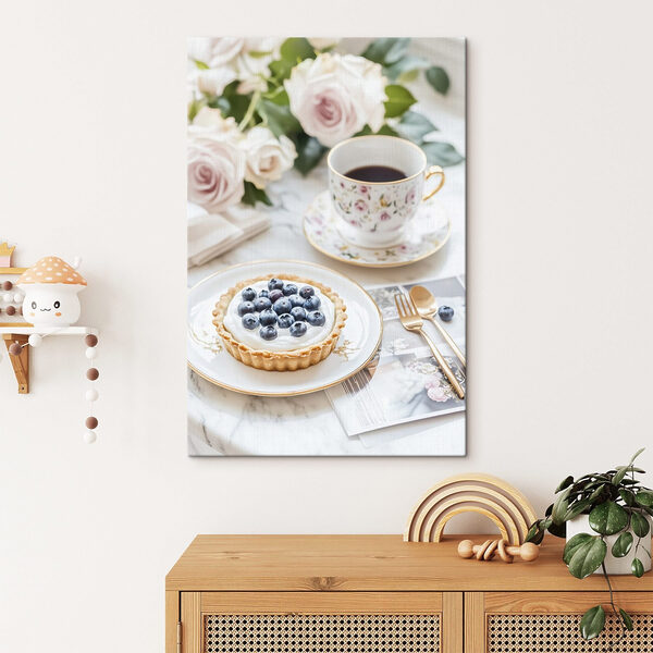 Dessert on a plate with a cup of coffee and flowers