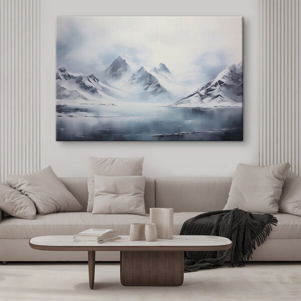 Snowy mountain range and a body of water Snowy mountain range and a body of water