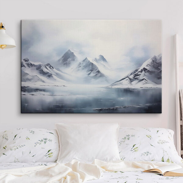 Snowy mountain range and a body of water Snowy mountain range and a body of water