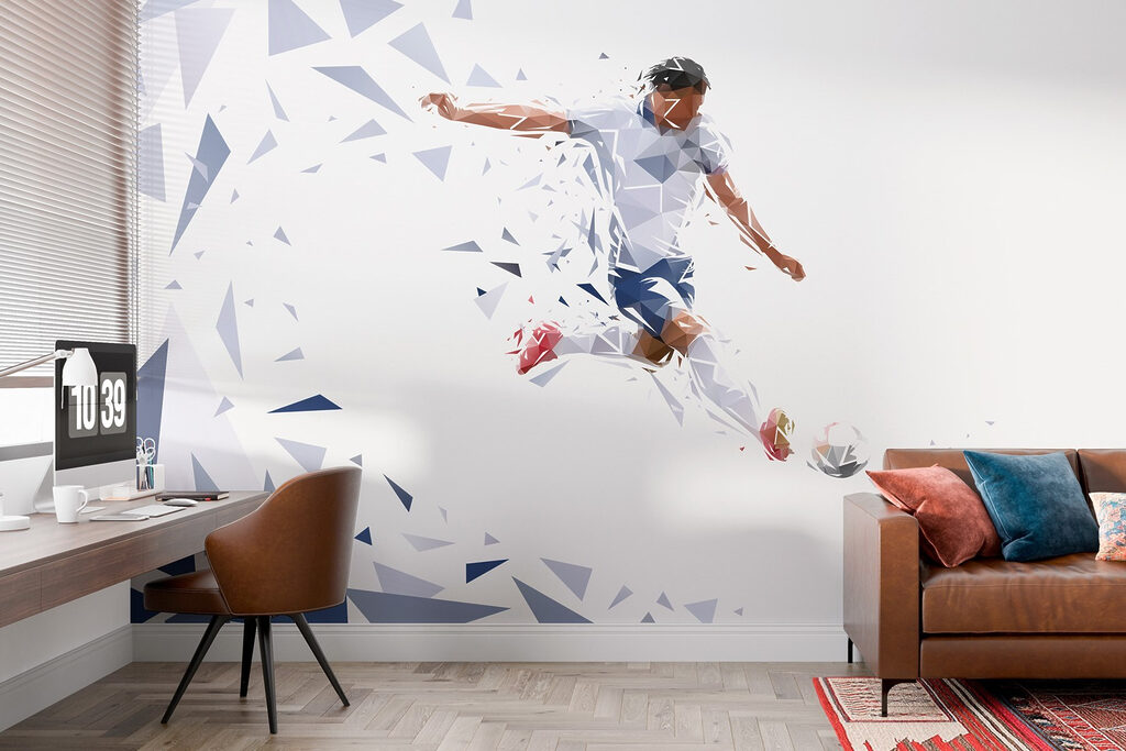 Man kicking a football ball