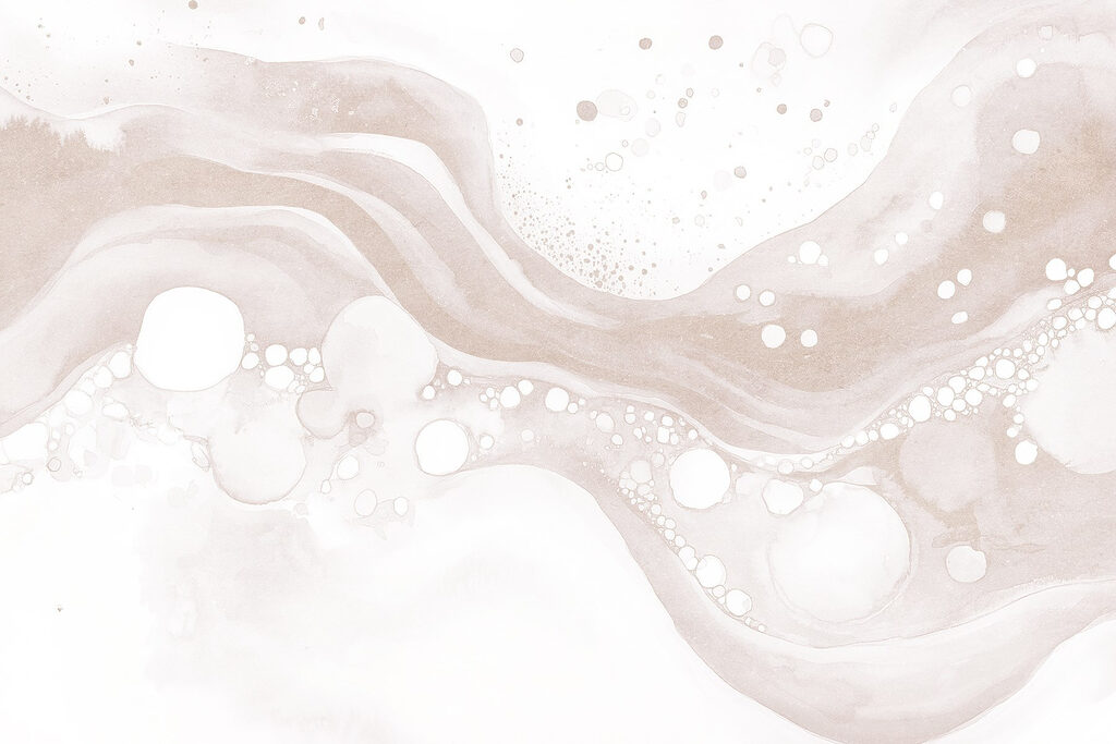 White and brown liquid with white circles and dots