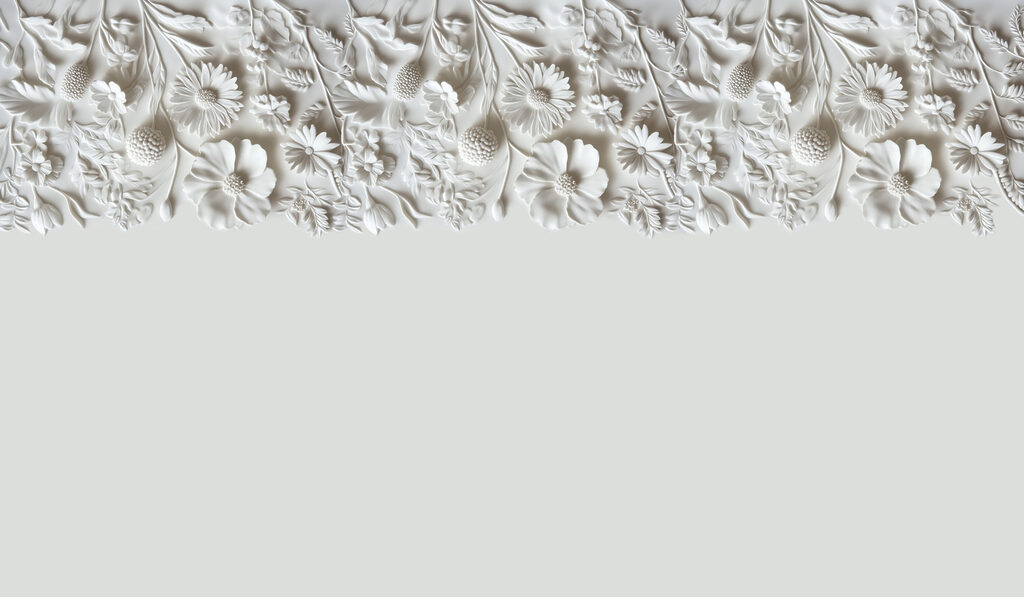 Diseño floral blanco en una pared Diseño floral blanco en una pared
