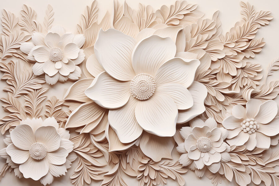 Flores y hojas blancas en una pared