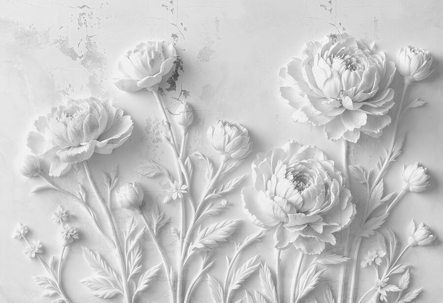 Tallado de flores blancas en una pared