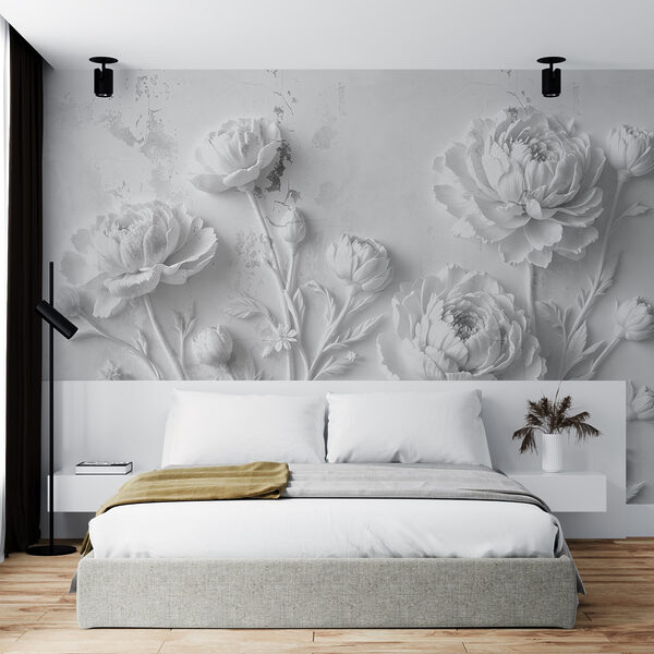 Tallado de flores blancas en una pared Tallado de flores blancas en una pared