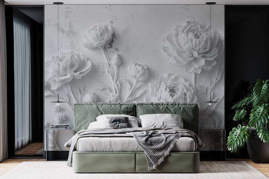 Tallado de flores blancas en una pared