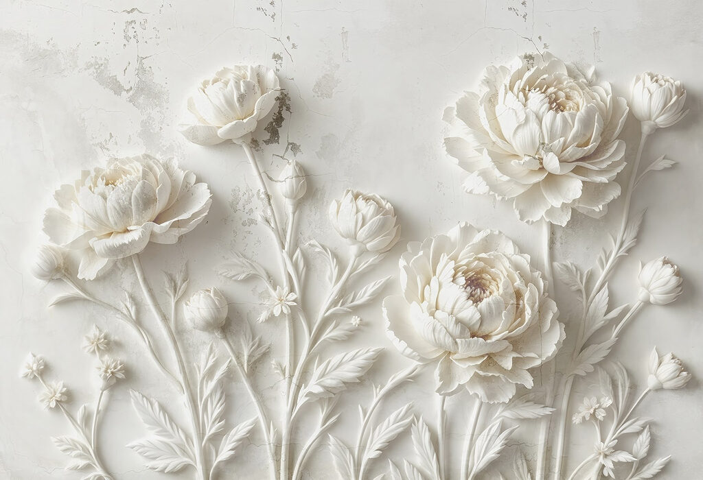 Tallado de flores blancas en una pared Tallado de flores blancas en una pared