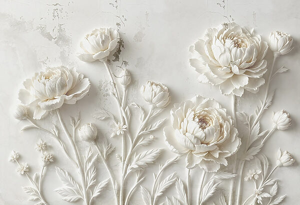 Tallado de flores blancas en una pared Tallado de flores blancas en una pared