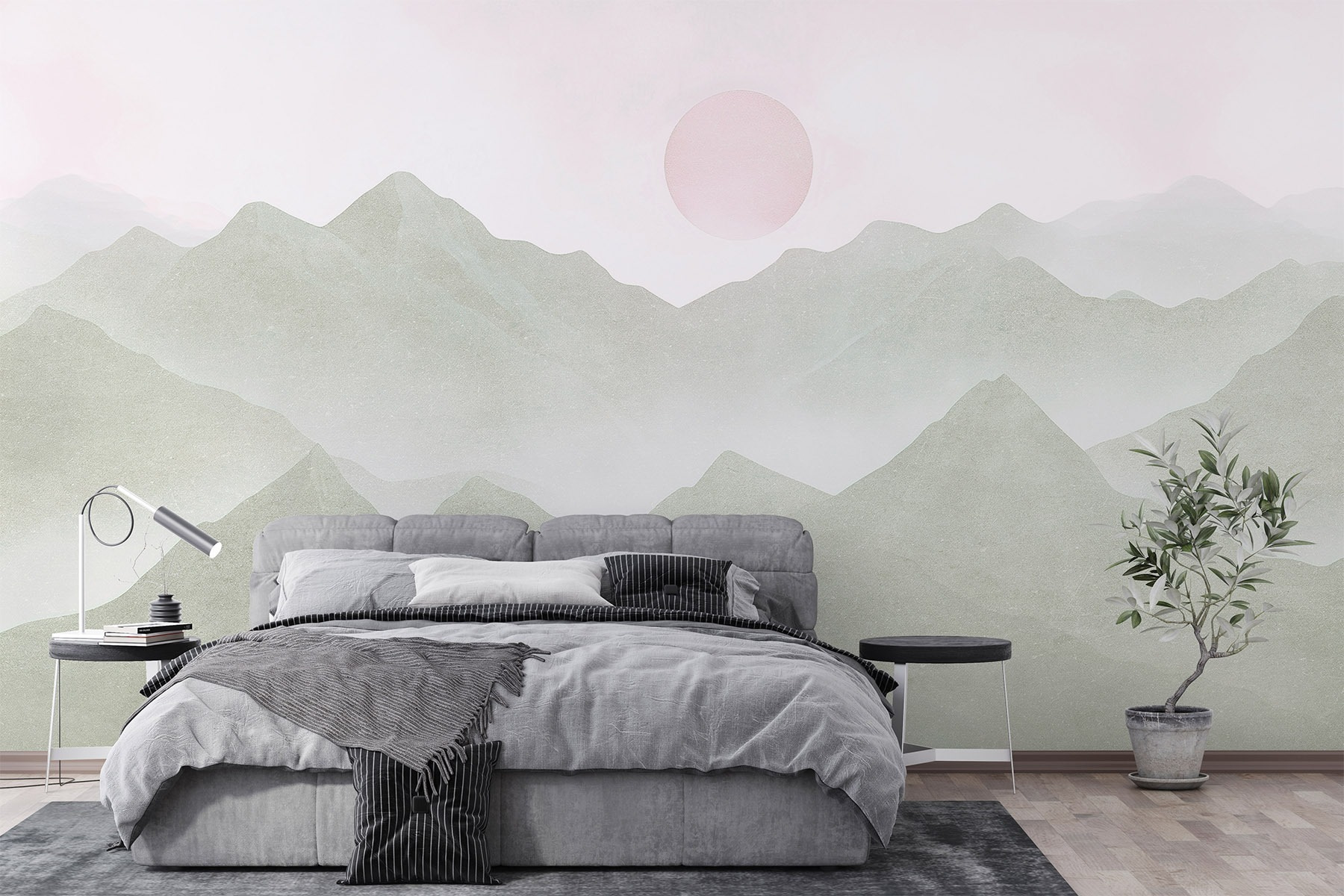 Mountain range with a sun in the distance