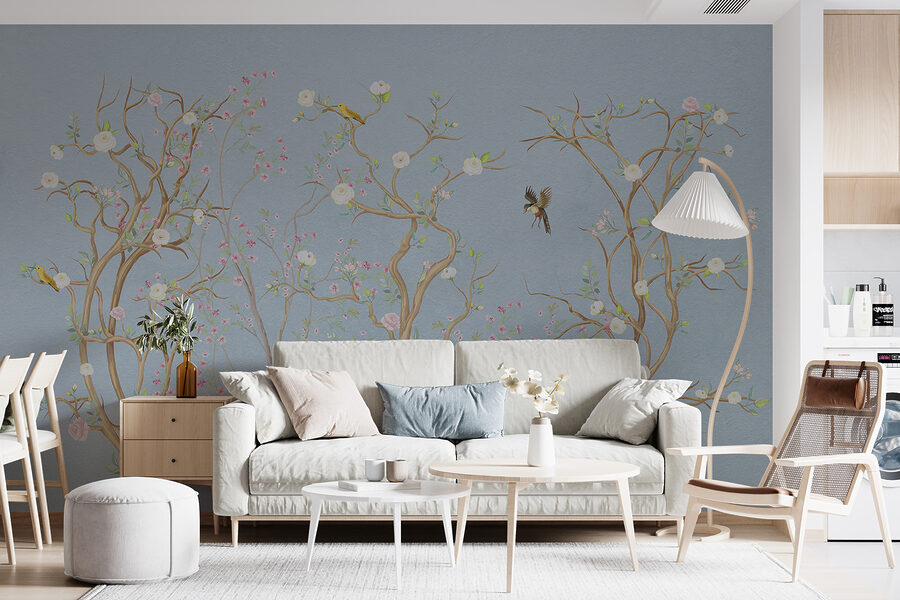 Mural de un árbol con flores y pájaros