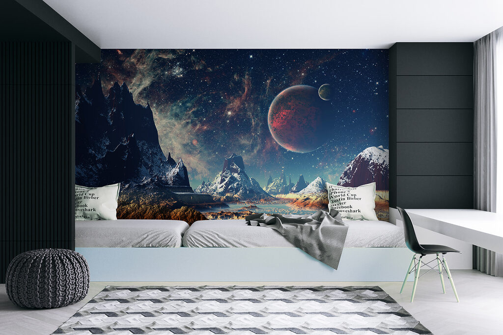 Landscape of mountains and water with planets and stars