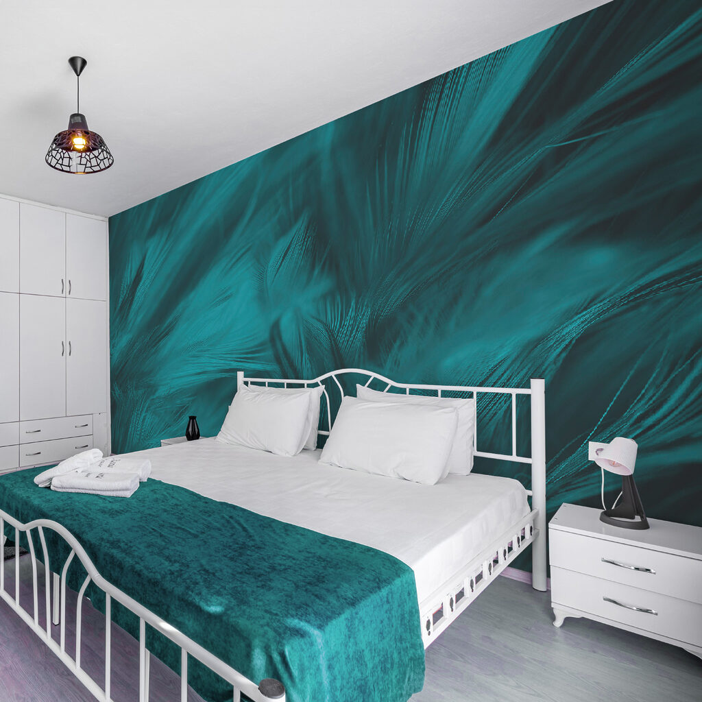 Soft teal feathers in gentle waves