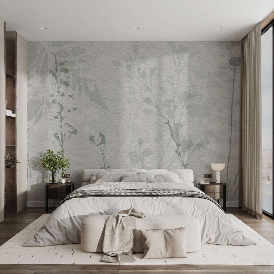 Pared blanca con hojas verdes