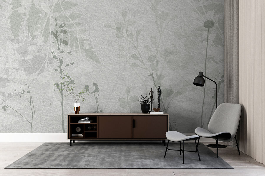 Pared blanca con hojas verdes