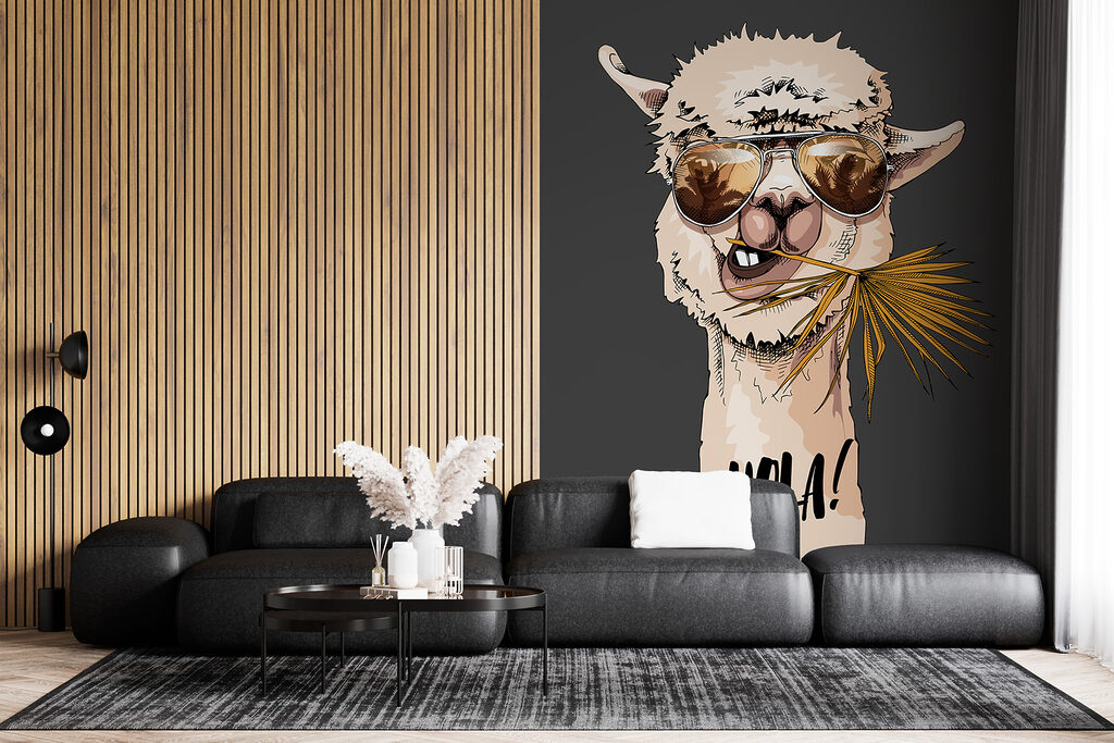 A llama wearing sunglasses and eating a leaf