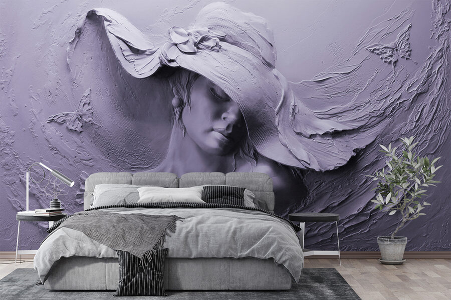 Escultura de una mujer con sombrero