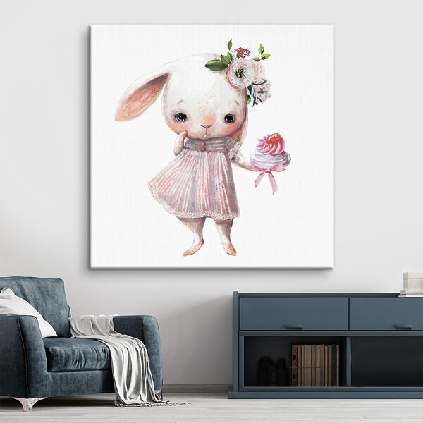 A cartoon of a bunny holding a cupcake