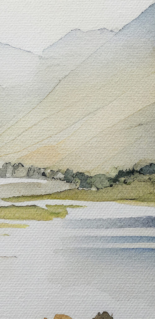 Watercolor of a lake surrounded by mountains