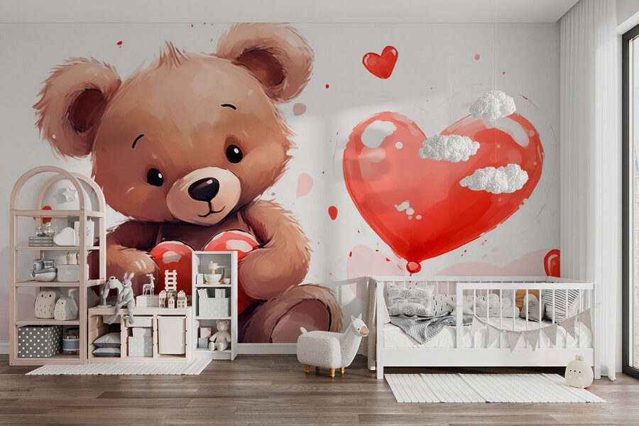 Osito de peluche con un corazón en la mano