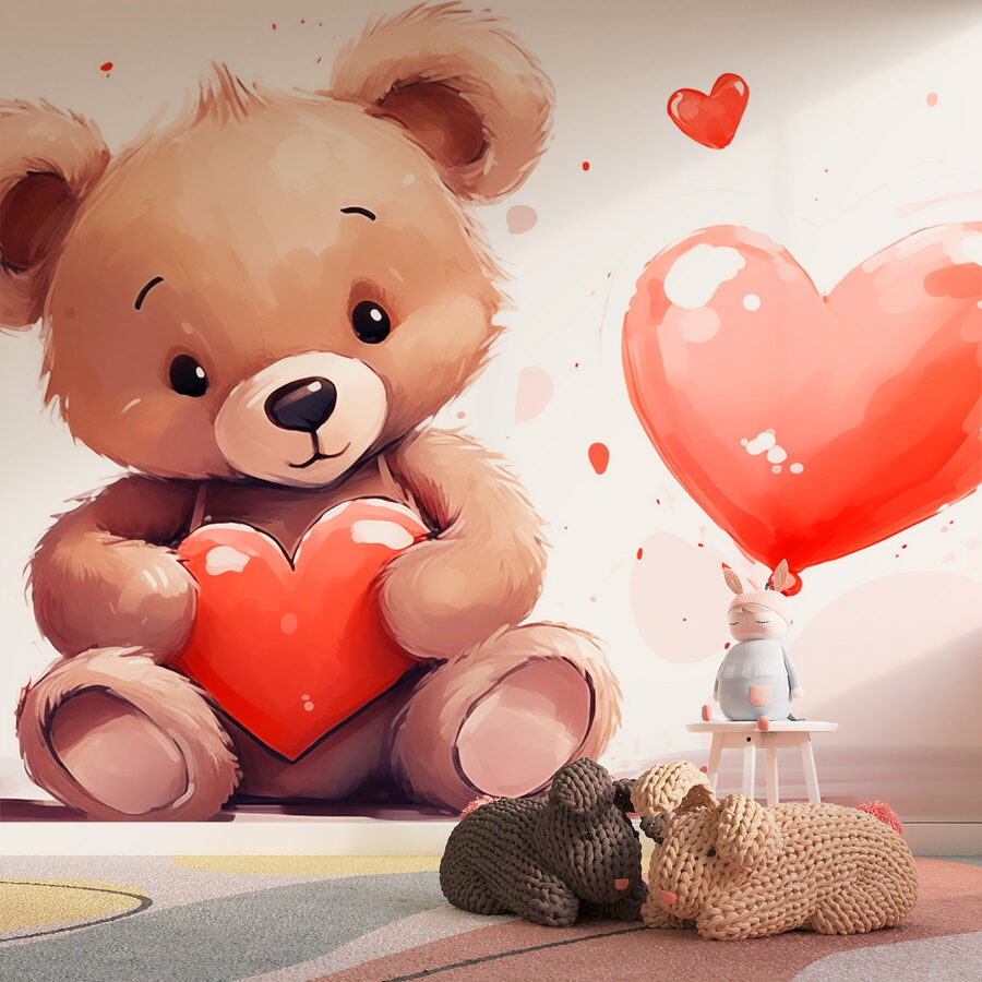 Osito de peluche con un corazón en la mano