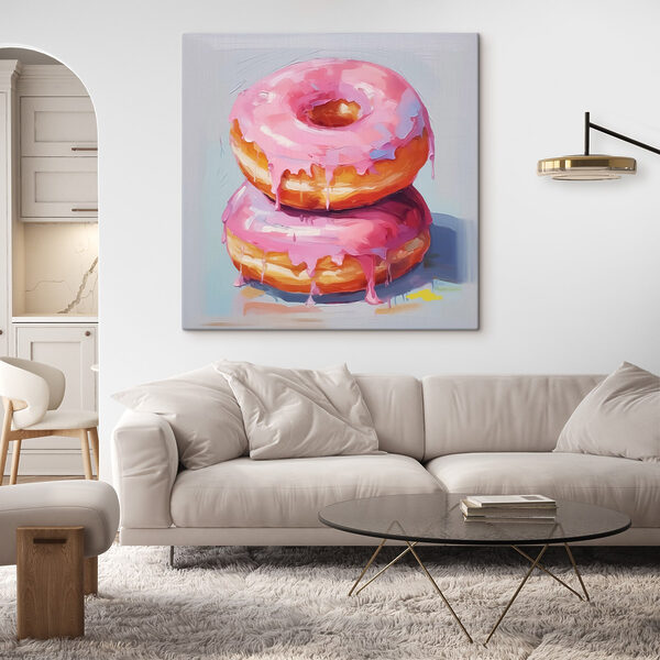 Two donuts with pink frosting Two donuts with pink frosting