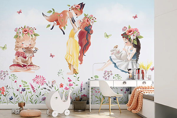 Group of girls holding animals in a field of flowers