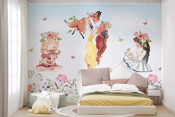 Group of girls holding animals in a field of flowers