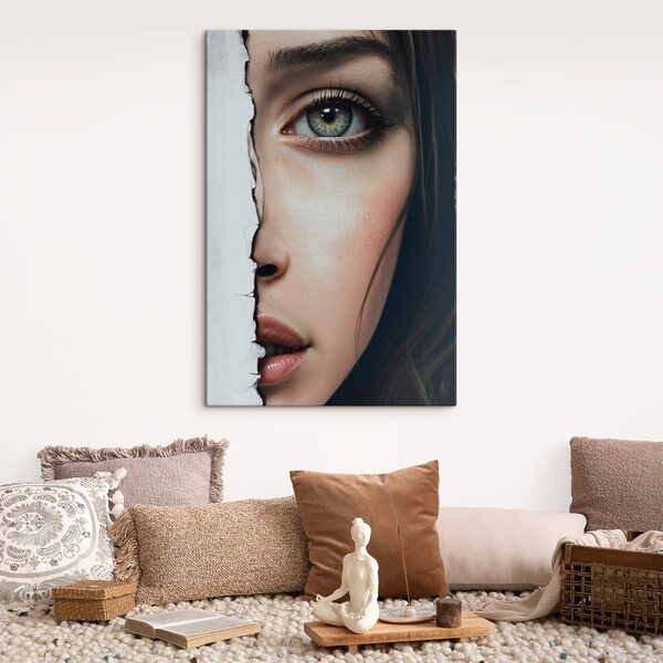 Woman's face with a torn paper