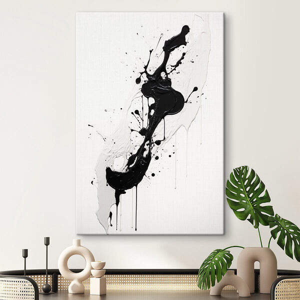 Cuadros Salpicaduras de pintura blanca y negra sobre una superficie blanca