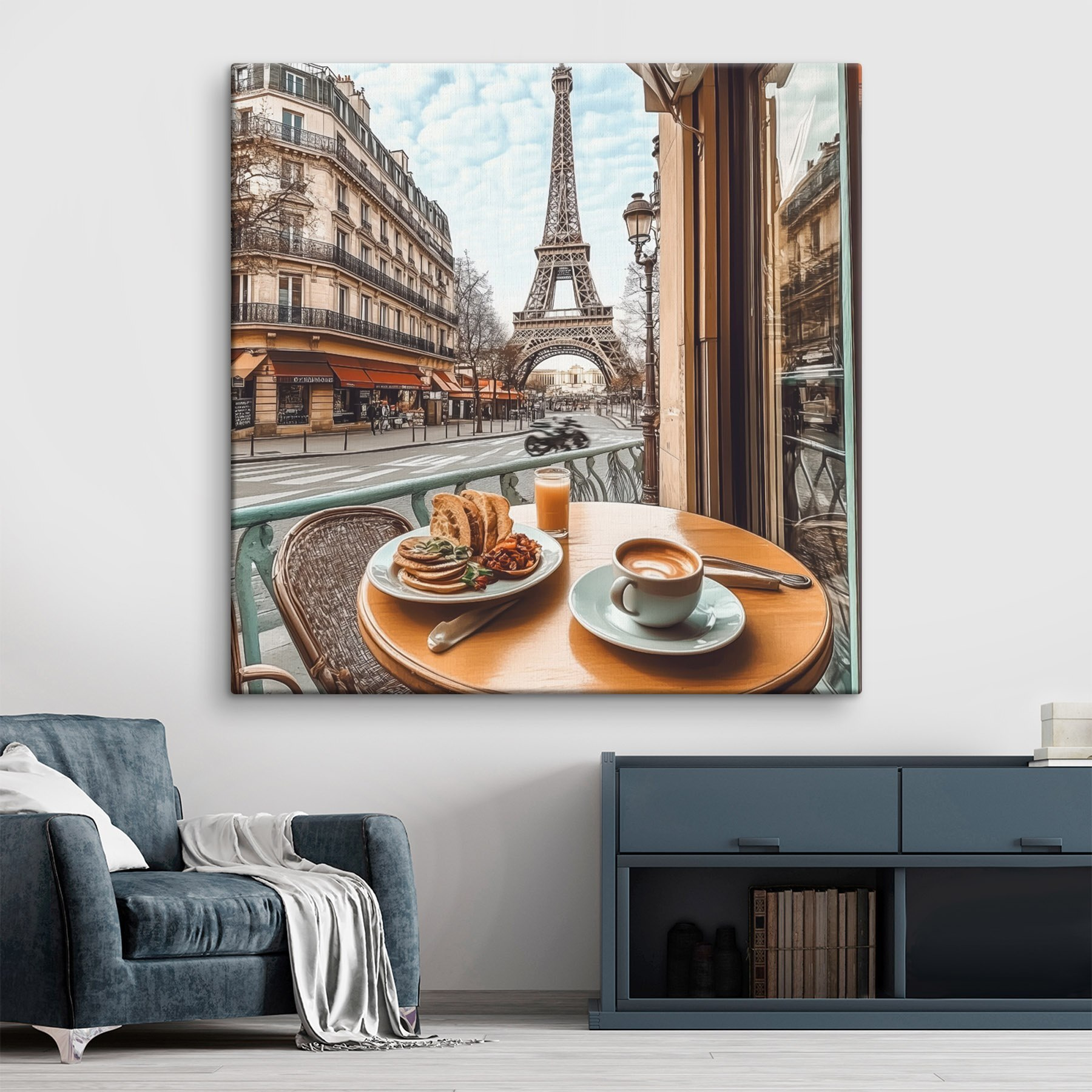Table with a plate of food and a cup of coffee on it Table with a plate of food and a cup of coffee on it