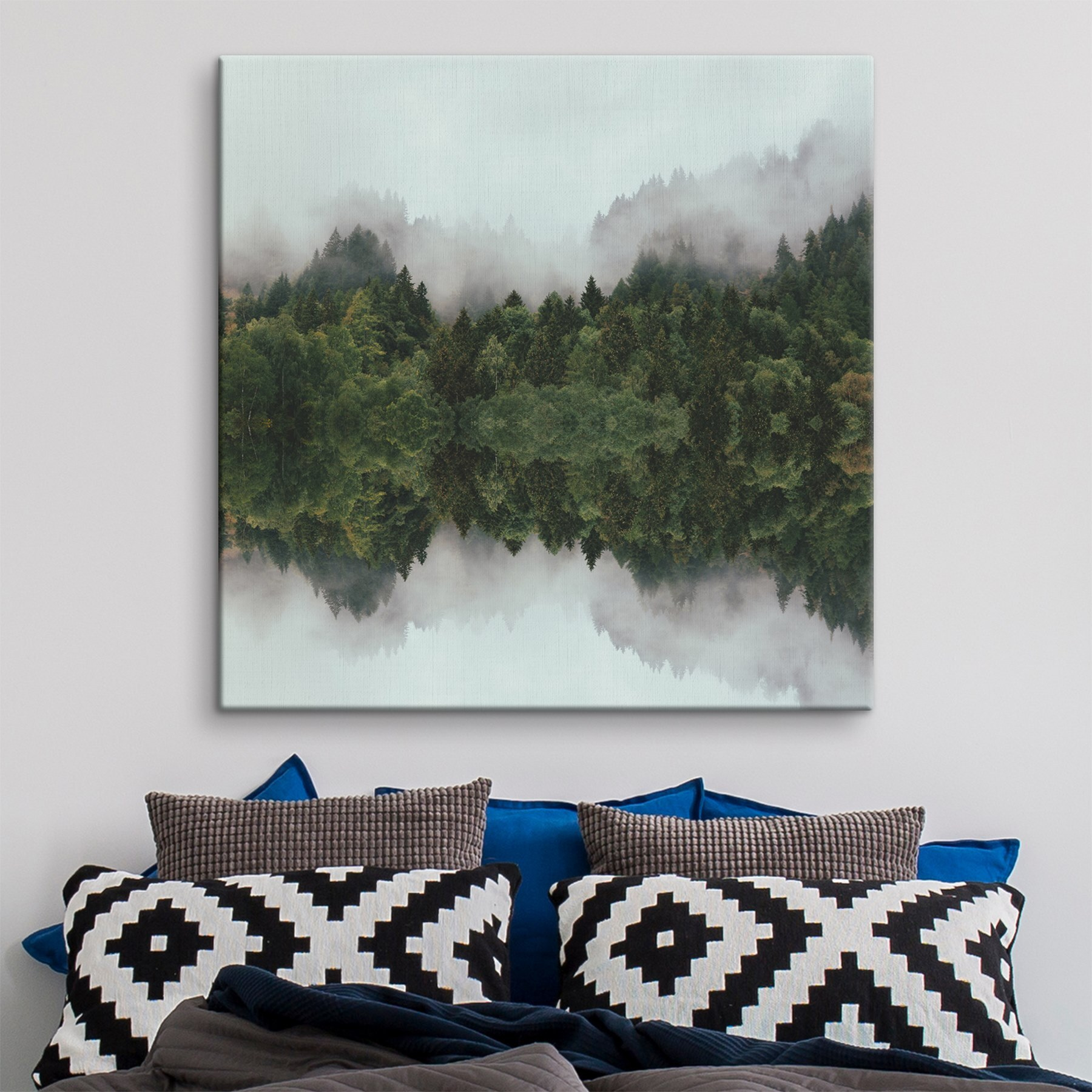 A reflection of trees in the water