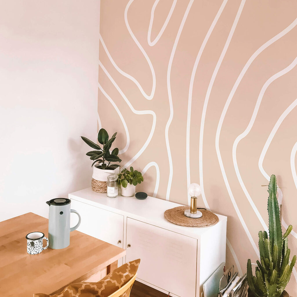 Líneas blancas sobre fondo rosa