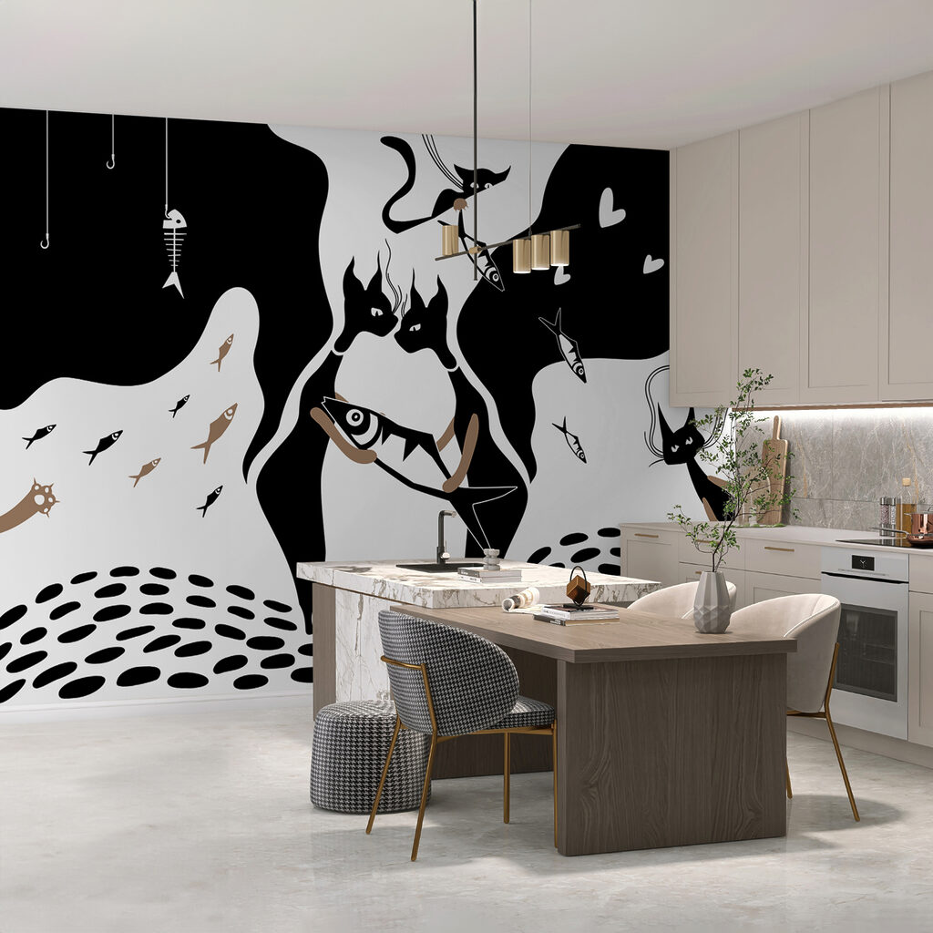 Gato blanco y negro con pez y pez