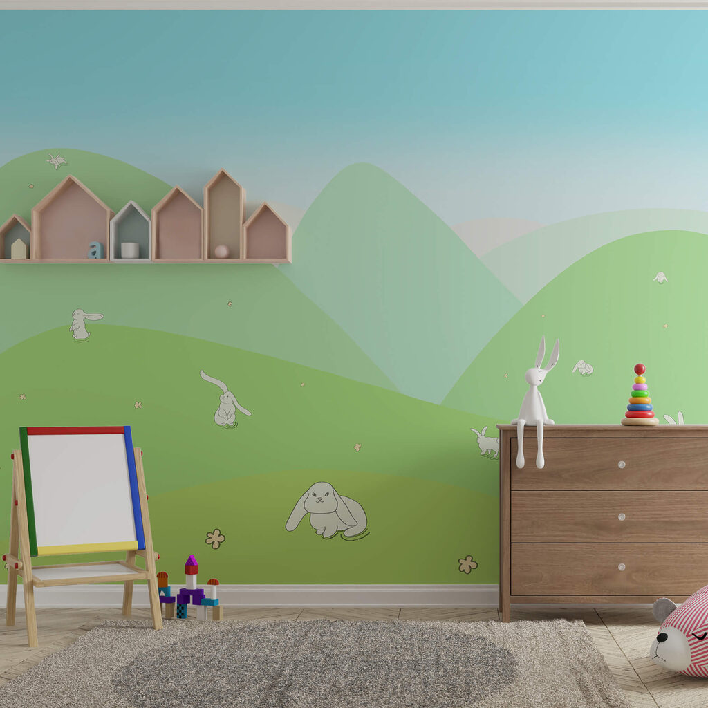 Dibujo animado de conejitos en una colina verde