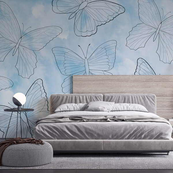 Patrón de mariposas sobre fondo azul
