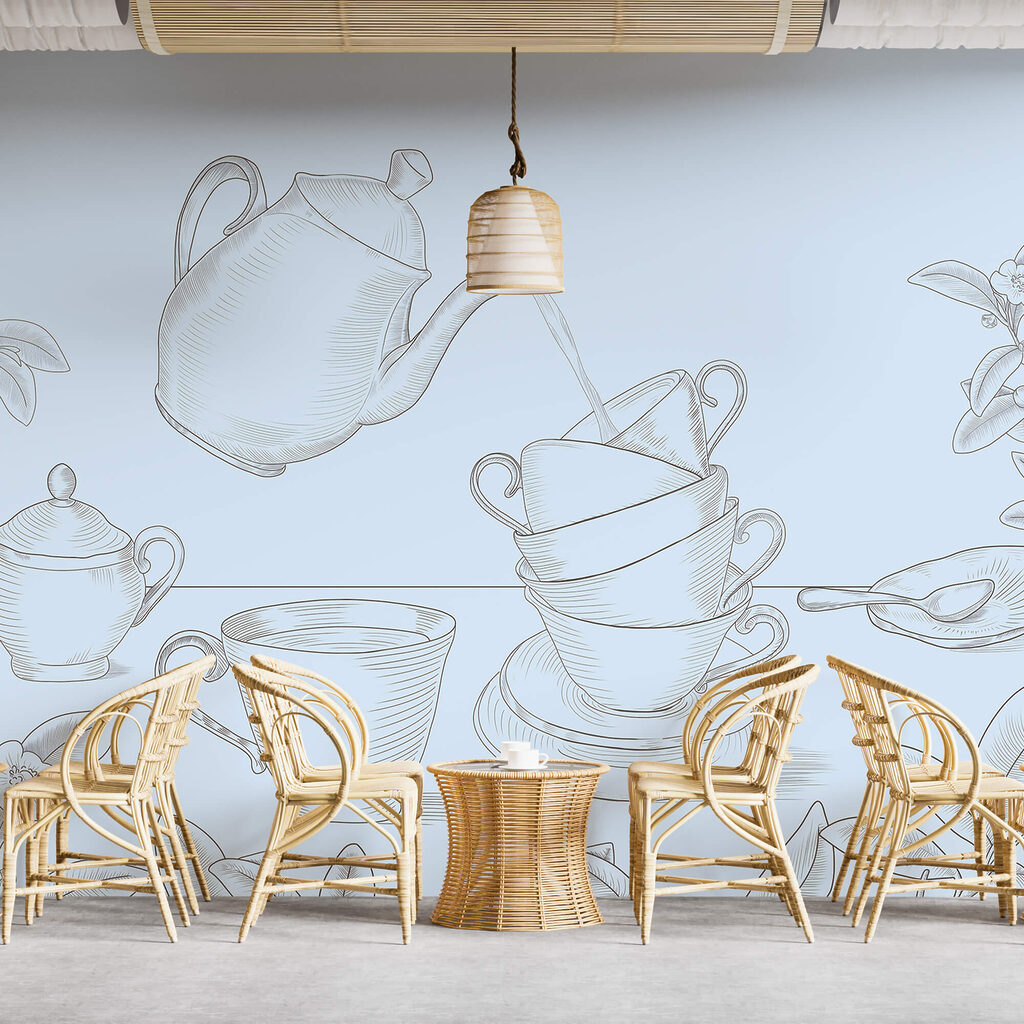 Tetera vertiendo en una pila de tazas de té