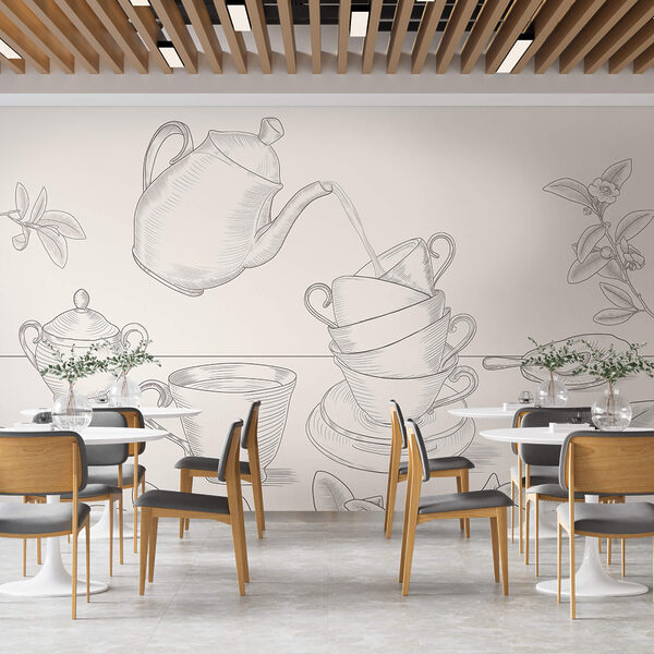 Tetera vertiendo en una pila de tazas de té Tetera vertiendo en una pila de tazas de té