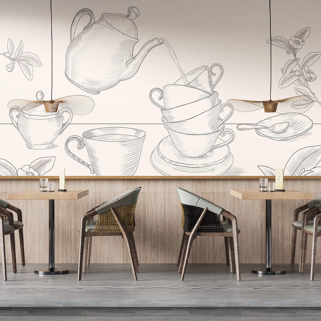 Tetera vertiendo en una pila de tazas de té Tetera vertiendo en una pila de tazas de té