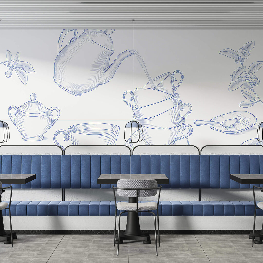 Tetera vertiendo en una pila de tazas de té Tetera vertiendo en una pila de tazas de té