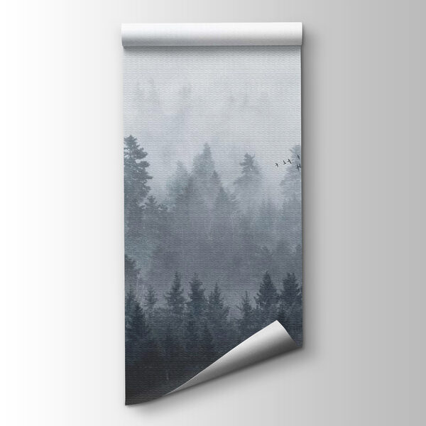 Group of birds flying over a forest