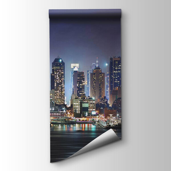 City skyline at night with lights reflecting on water City skyline at night with lights reflecting on water