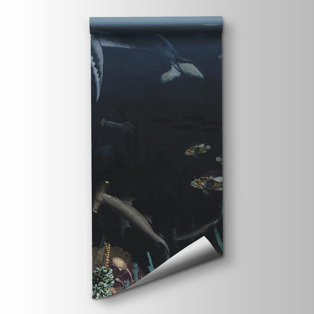Group of fish and whales swimming in the ocean